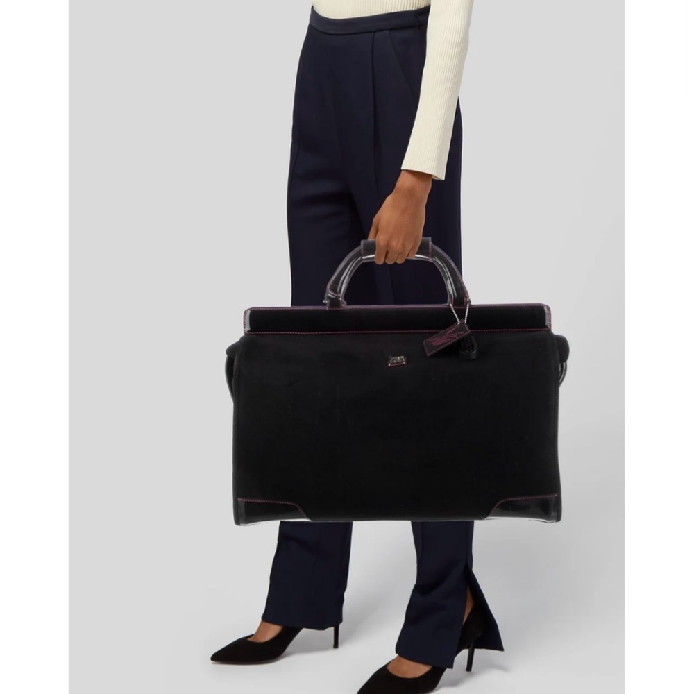 Diane von Furstenberg
Patent Leather Trimmed Travel Bag